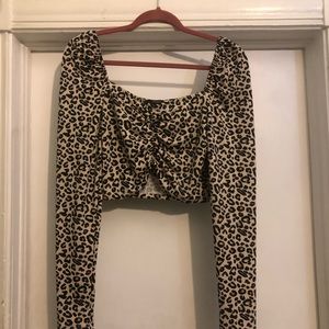 Cropped long sleeve leopard top